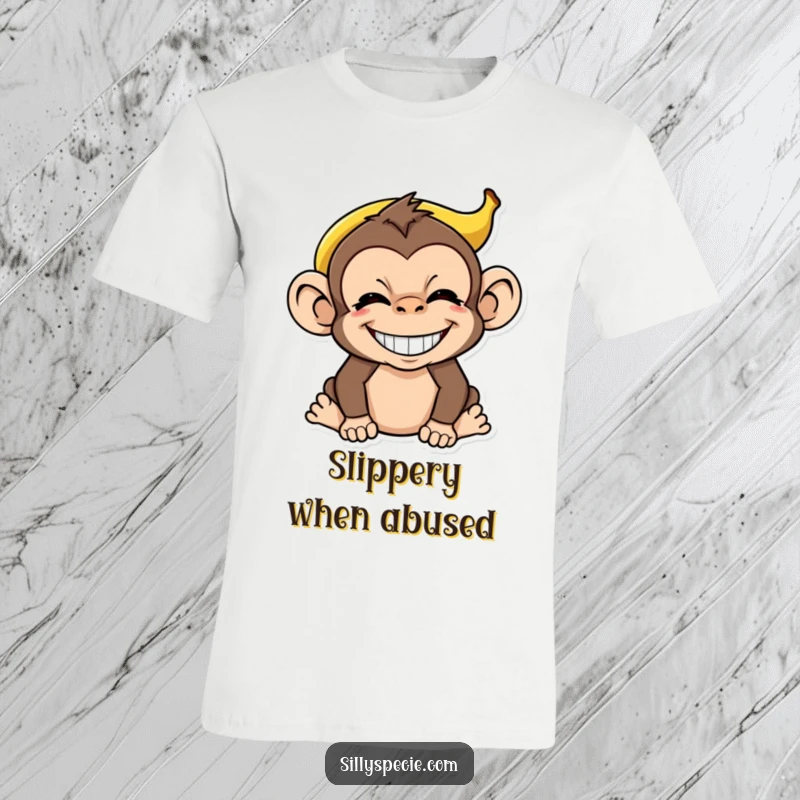 Funny Monkey T-Shirt with a banana peel on its head, grinning absurdly, capturing pure silliness and jungle humor for a gift.