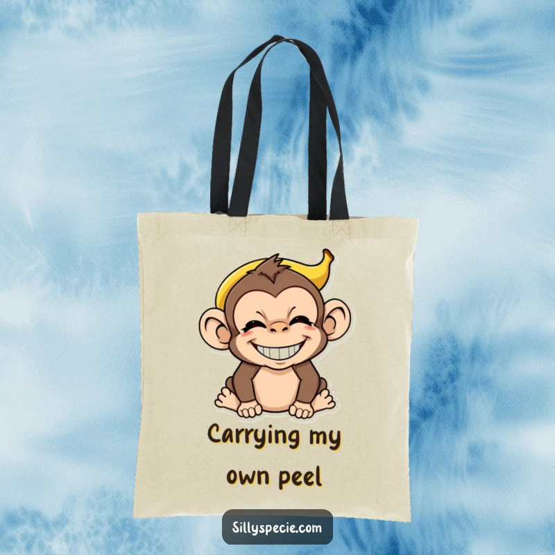 Funny Monkey Tote Bag featuring a silly grin and a banana peel on its head, highlighting comical jungle antics for a gift.